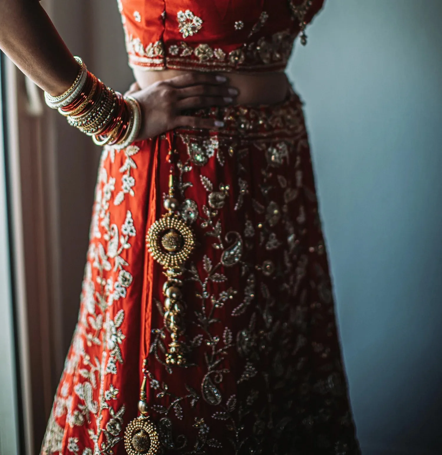 Detail of red and gold event attire